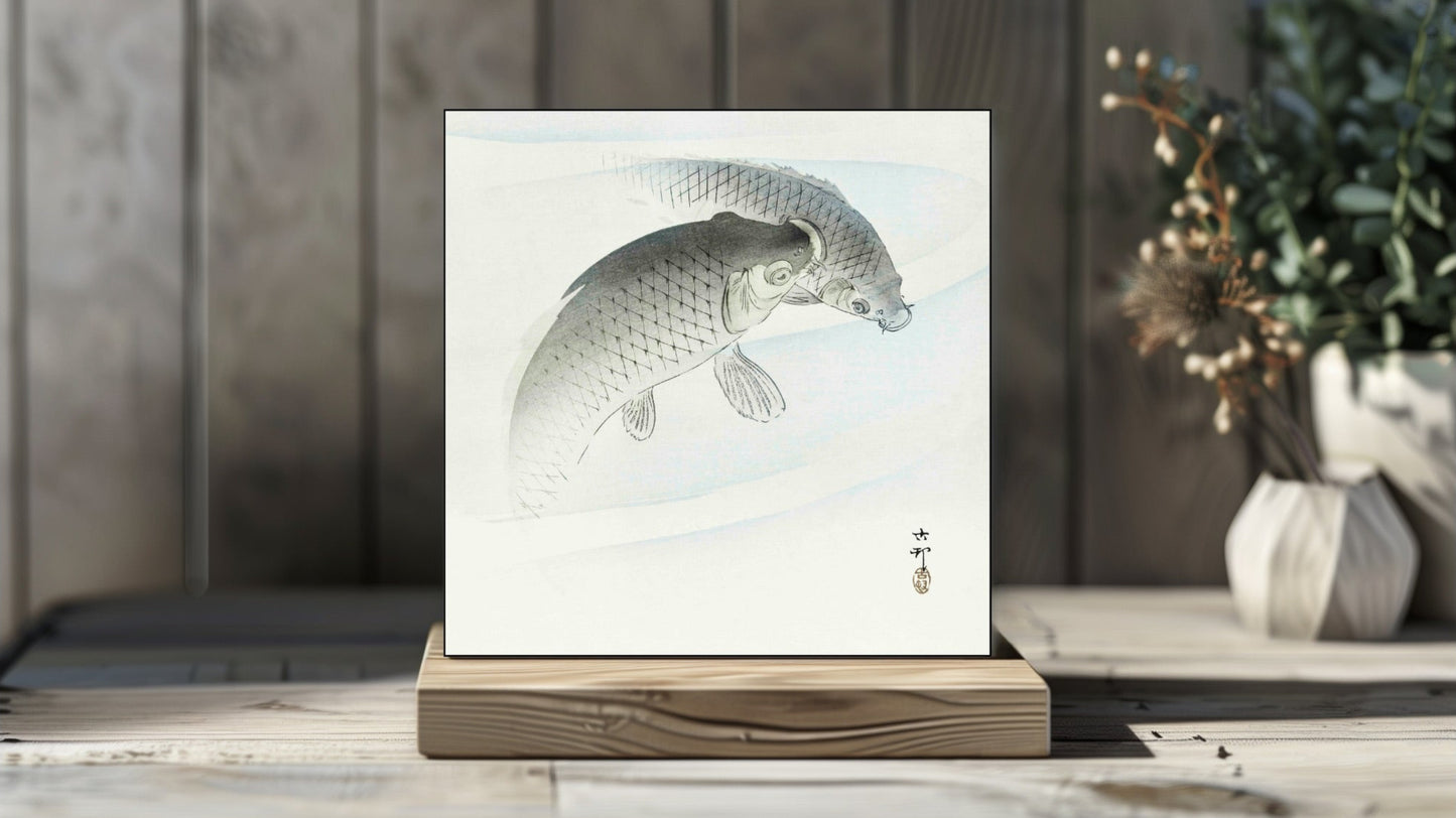 Ohara Koson's Ukiyo-e style 'Two Carp Fish' Japanese art on a decorative ceramic tile (digital representation).