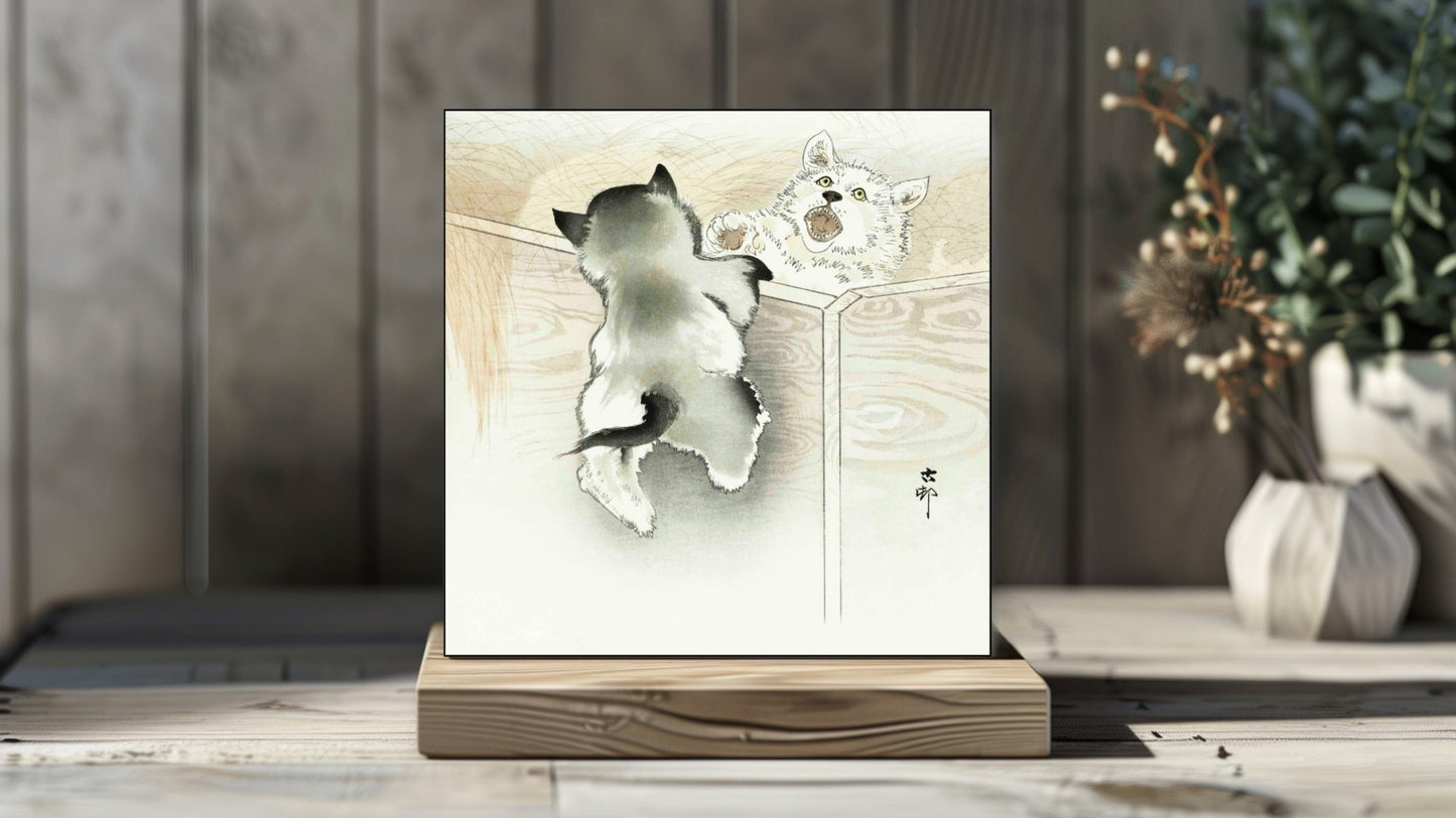 Ohara Koson's Ukiyo-e style 'Two Playing Dogs' Japanese art on a decorative ceramic tile (digital representation).